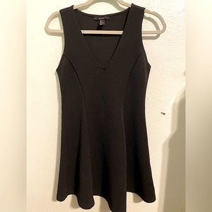 Black dress with tennis skirt like bottom, shallow v neckline. Size:M, forever21